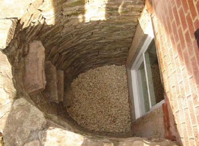 Simple Window Well Drainage Keeps Your Basement From Flooding